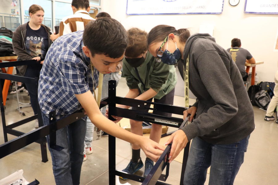 Robotics students meet after school to set up equipment for the new competition season. 