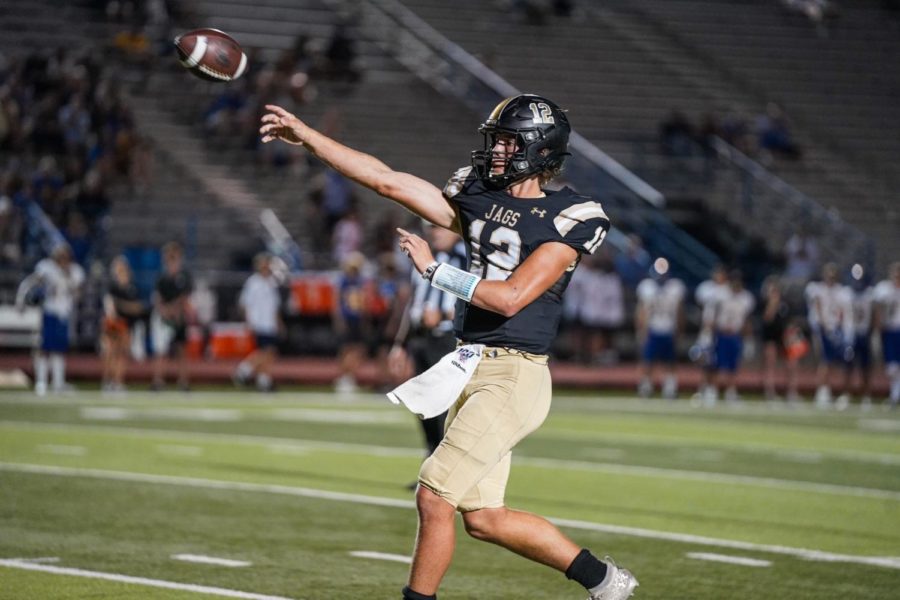 Junior Carson McMullin throws the ball to his intended receiver during the Homecoming game against Anderson.  