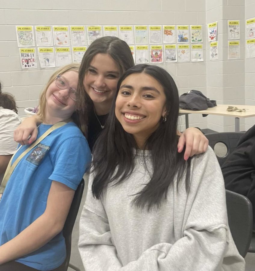 Freshman Abigail Piggott, junior Mallory Russell and senior Andrea Camarillo pose for a cast picture while at rehearsals. 