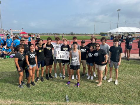 Junior Nico Lopez stands with his supporters before the regional cross county meet in Corpus Christi Oct. 24.