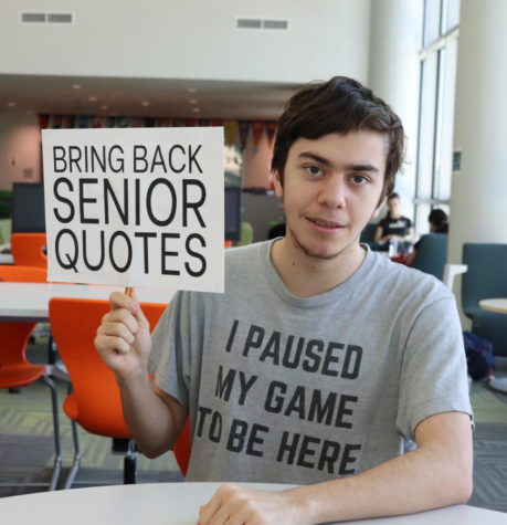 Holding a sign that reads Bring Back Senior Quotes, Alex Vasquez continues to campaign for their inclusion