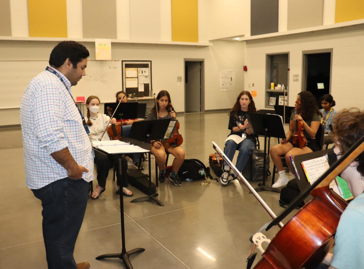 Cavasos teaching orchestra during 4A. 