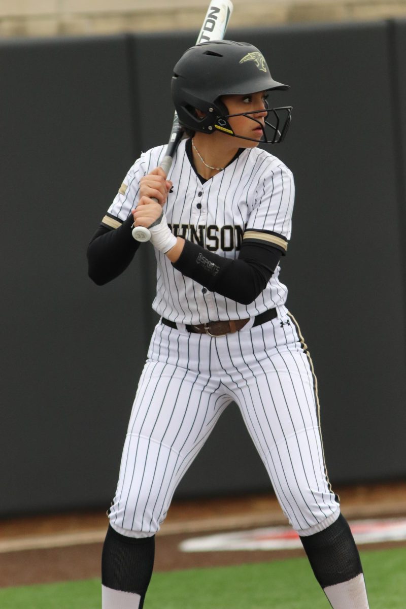 Squaring up: Junior Madie Mendoza rears up to swing. She grew up playing softball with her family and loves the sport. “Softball has been in my family for a long time,” Mendoza said. “My dad, mom, and all my cousins play, so I grew up watching them and feel kind of connected to them.”