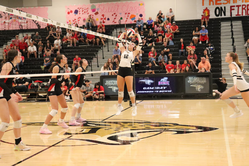 Junior Setter Macy Philips setting the ball to the Bowie team.