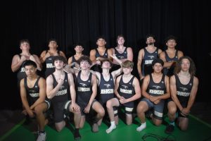 Boy wrestling team poses for photo.