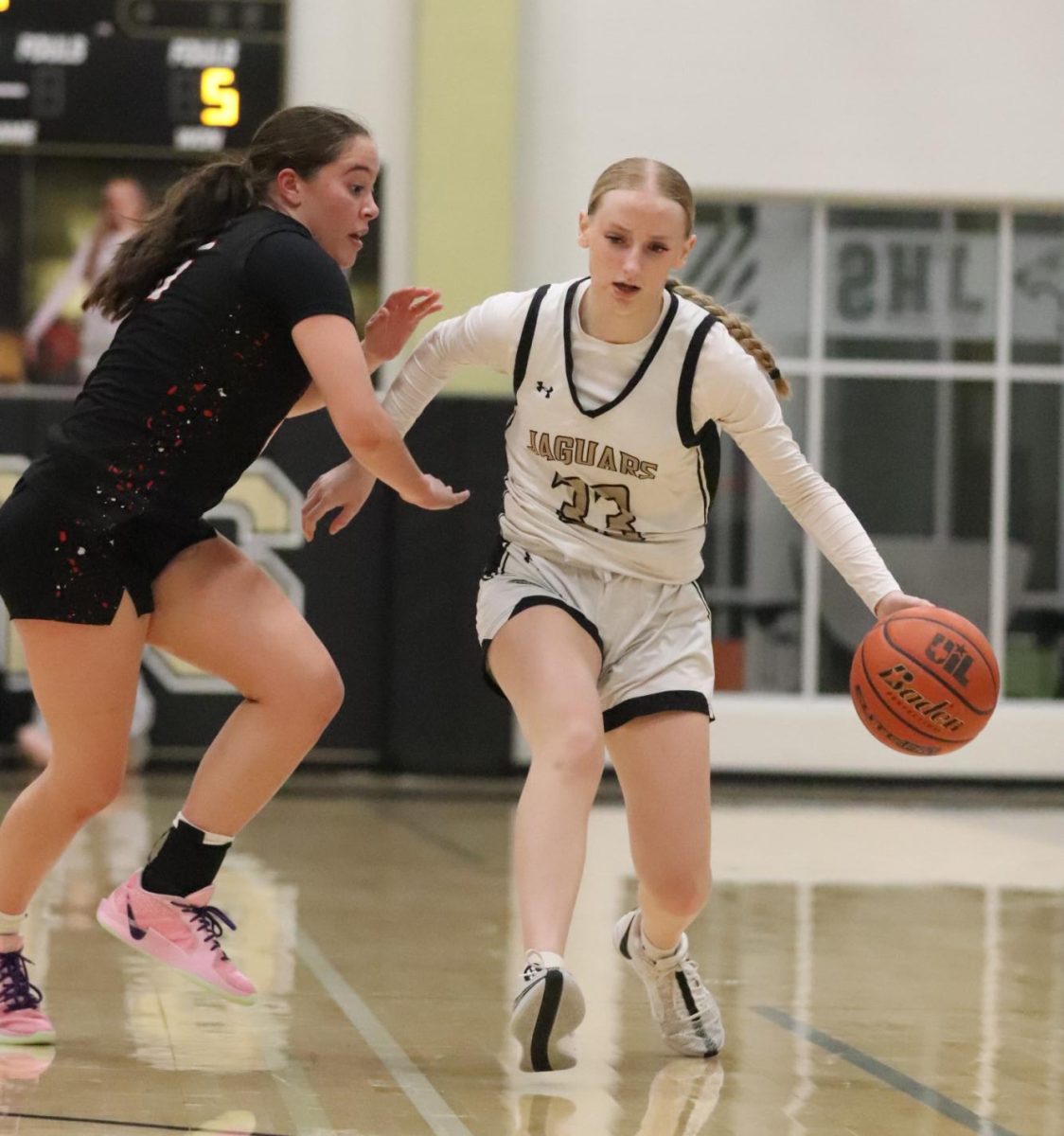 In it to Win it
Avery Kiefer makes her run down the court. The sophomore was able to improve her skills with the Nov. 19 game and learned more about what she needs for the next game. "I'm really excited," Kiefer said. "I think we'll do really good."