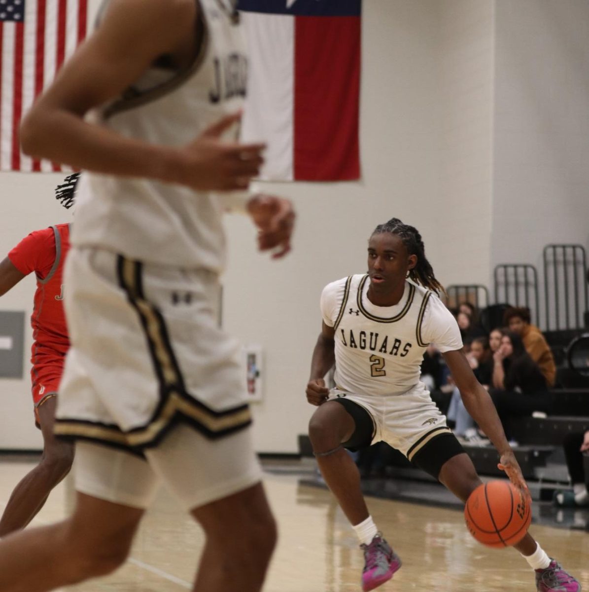 Cole Price dribbling the ball. 