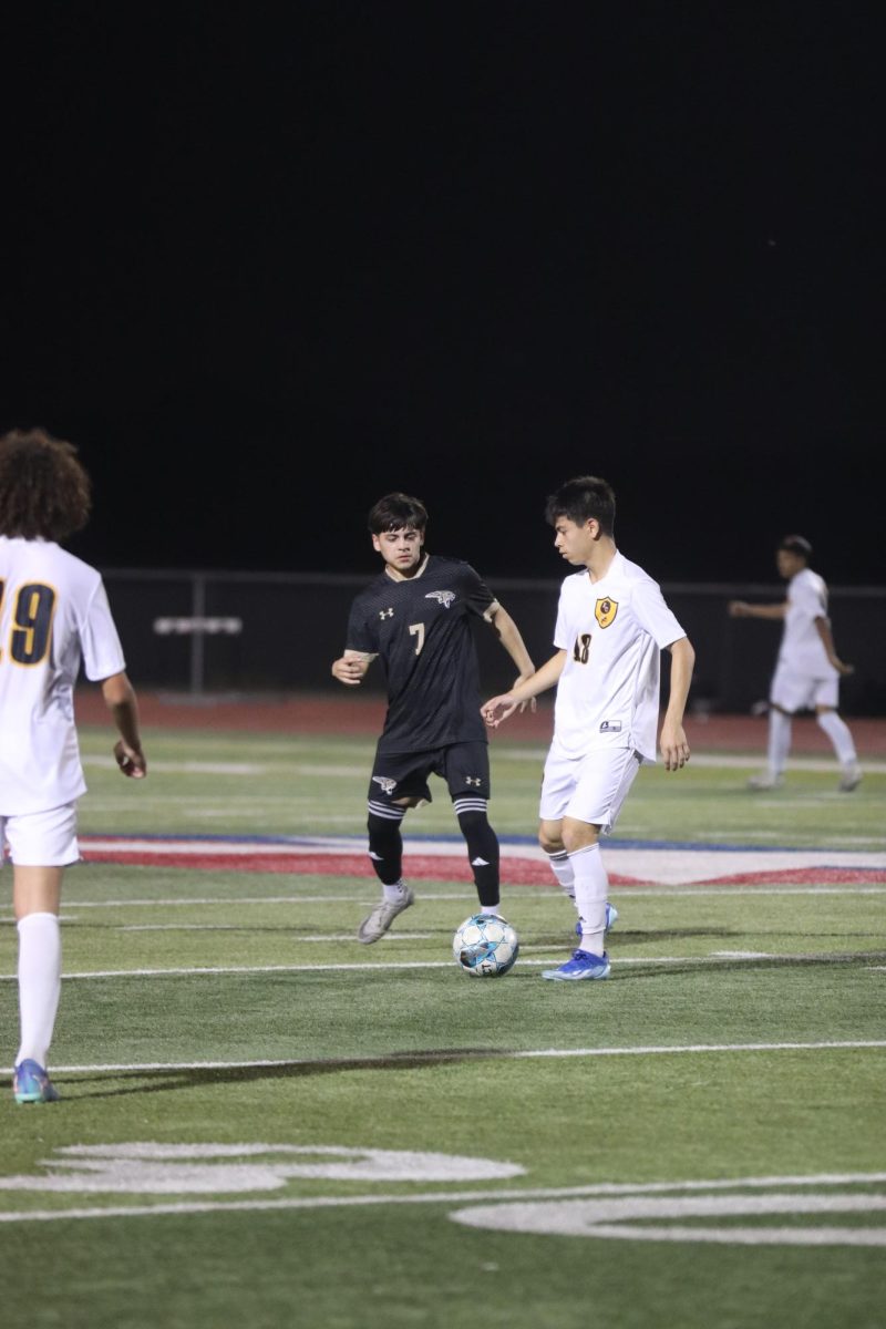 EJ Ocampo works to intercept and gain possession of the ball. 