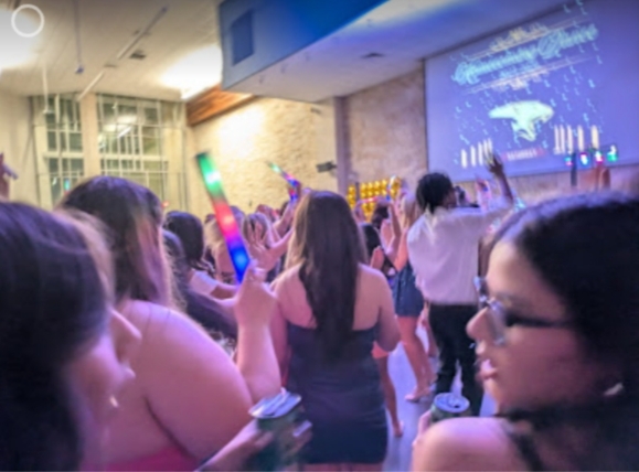 Students mingling during the Homecoming dance. 