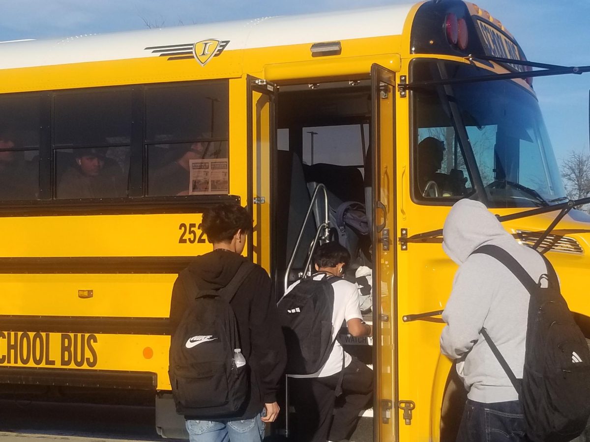 Students boarding their bus after school.